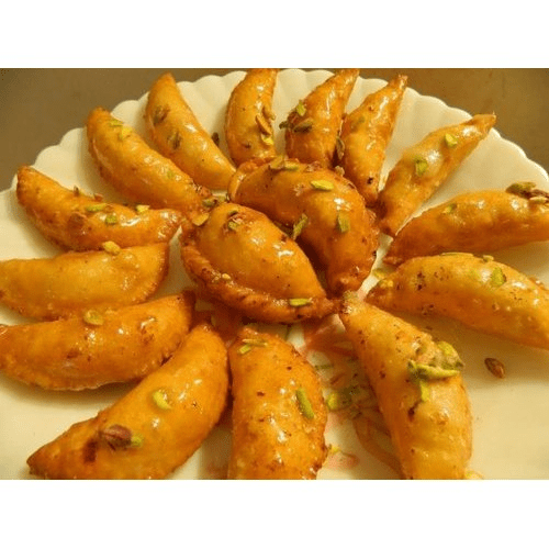 Gujjias fried in Cold Pressed Oil. A guilt free sweet